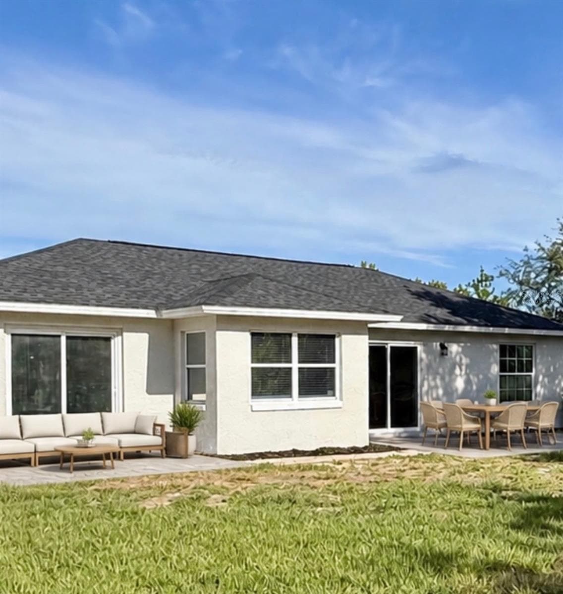 Back patio virtually staged - 10814 CRESCENDO LOOP, CLERMONT