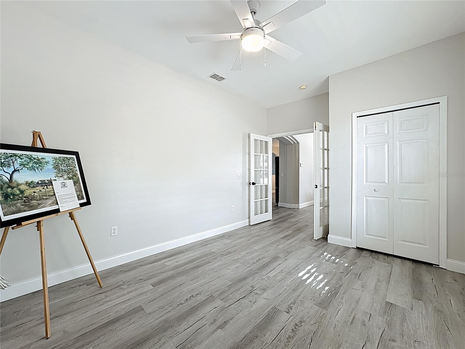 Front bedroom/office with French doors - 312 TOWHEE RD, WINTER HAVEN