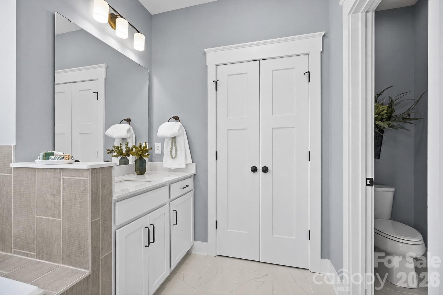 Owner's Bath Linen and Private Water Closet - Model Home, For Reference Only. - 3031 Grandiose Drive, Indian Trail