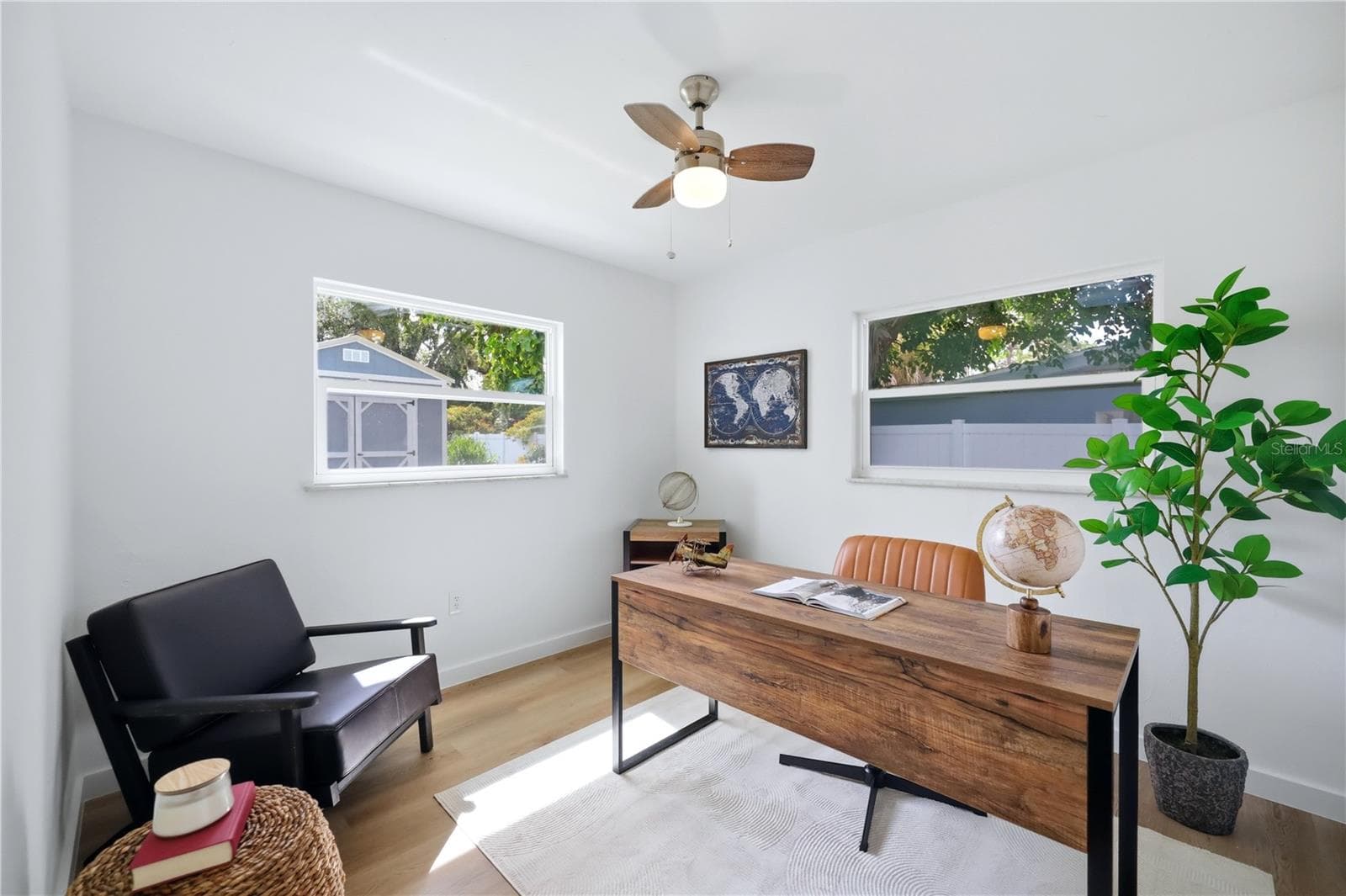 Flexible den or bedroom space with natural light and ceiling fan - 6103 CARLTON AVE, SARASOTA