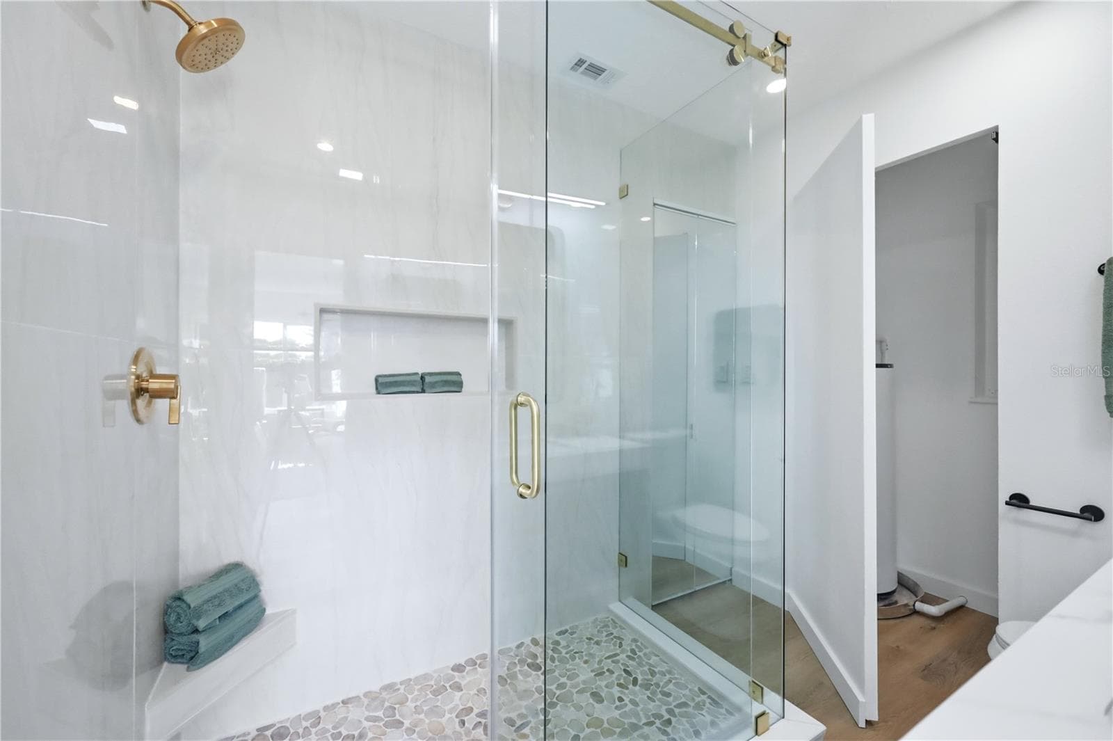 Glass enclosure shower in primary bedroom - 6103 CARLTON AVE, SARASOTA