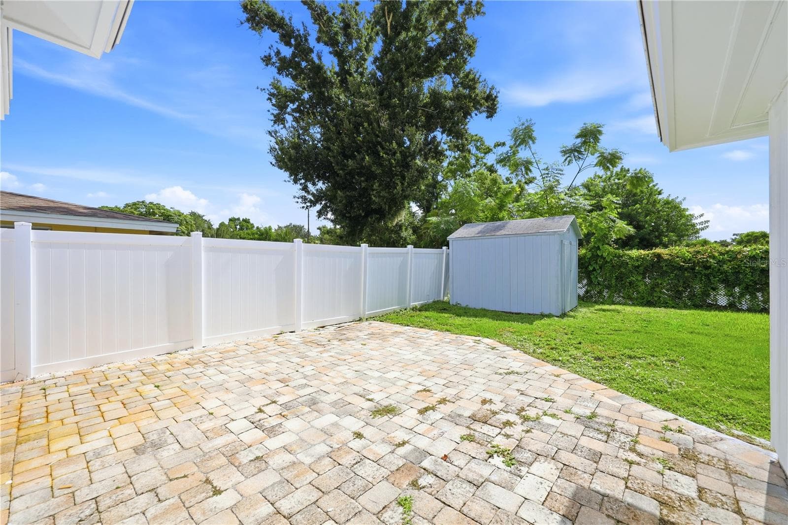 Large paver patio in back yard. great for entertaining. - 6103 CARLTON AVE, SARASOTA
