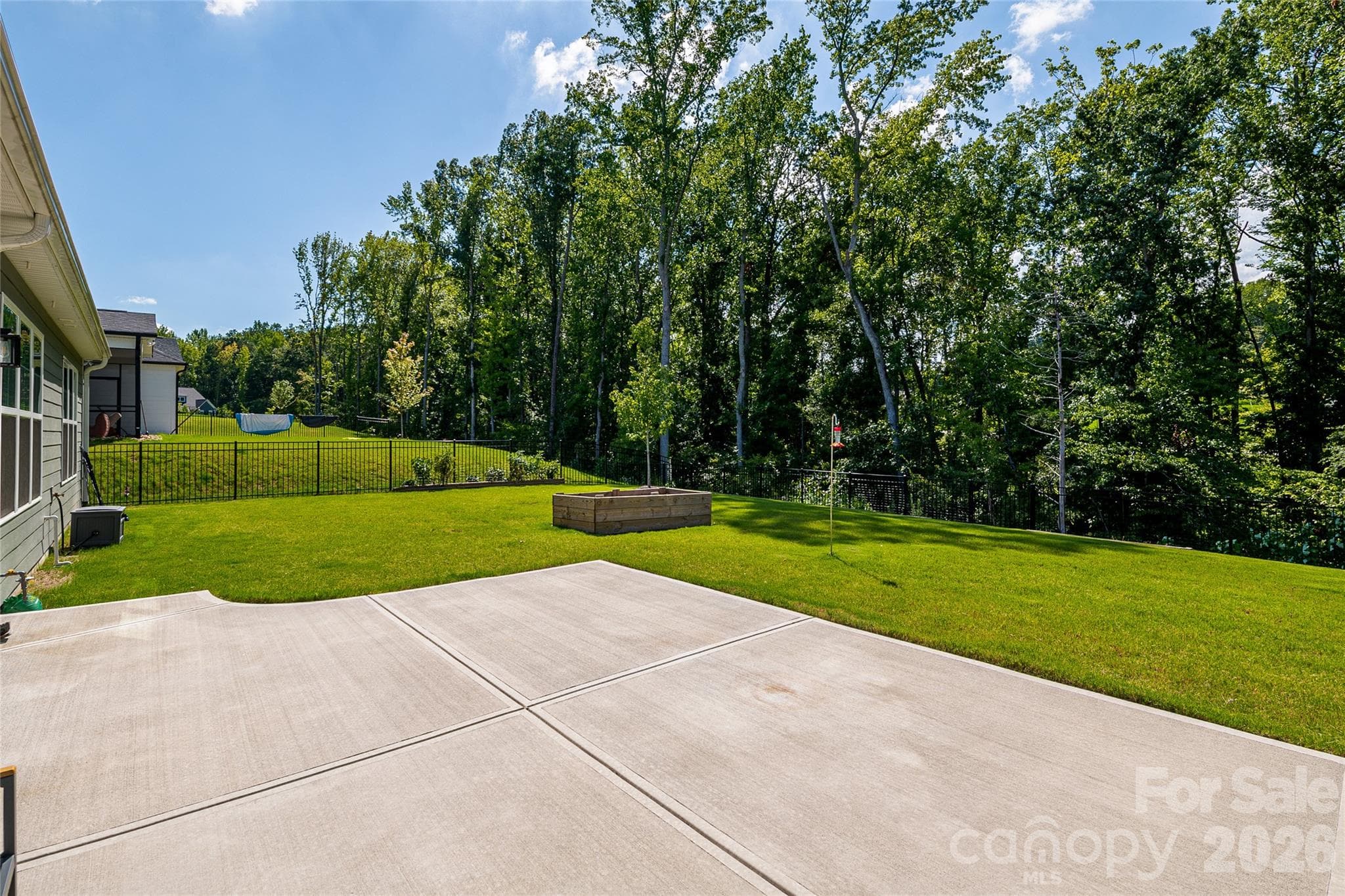 Upgrade: totally fenced-in backyard, 5 foot fence. Also, the owner also added a gas line to the deck/patio for a gas grill. enlarged the patio and added an additional water spigot for a total of 3. - 2566 NW Red Hill Street, Concord