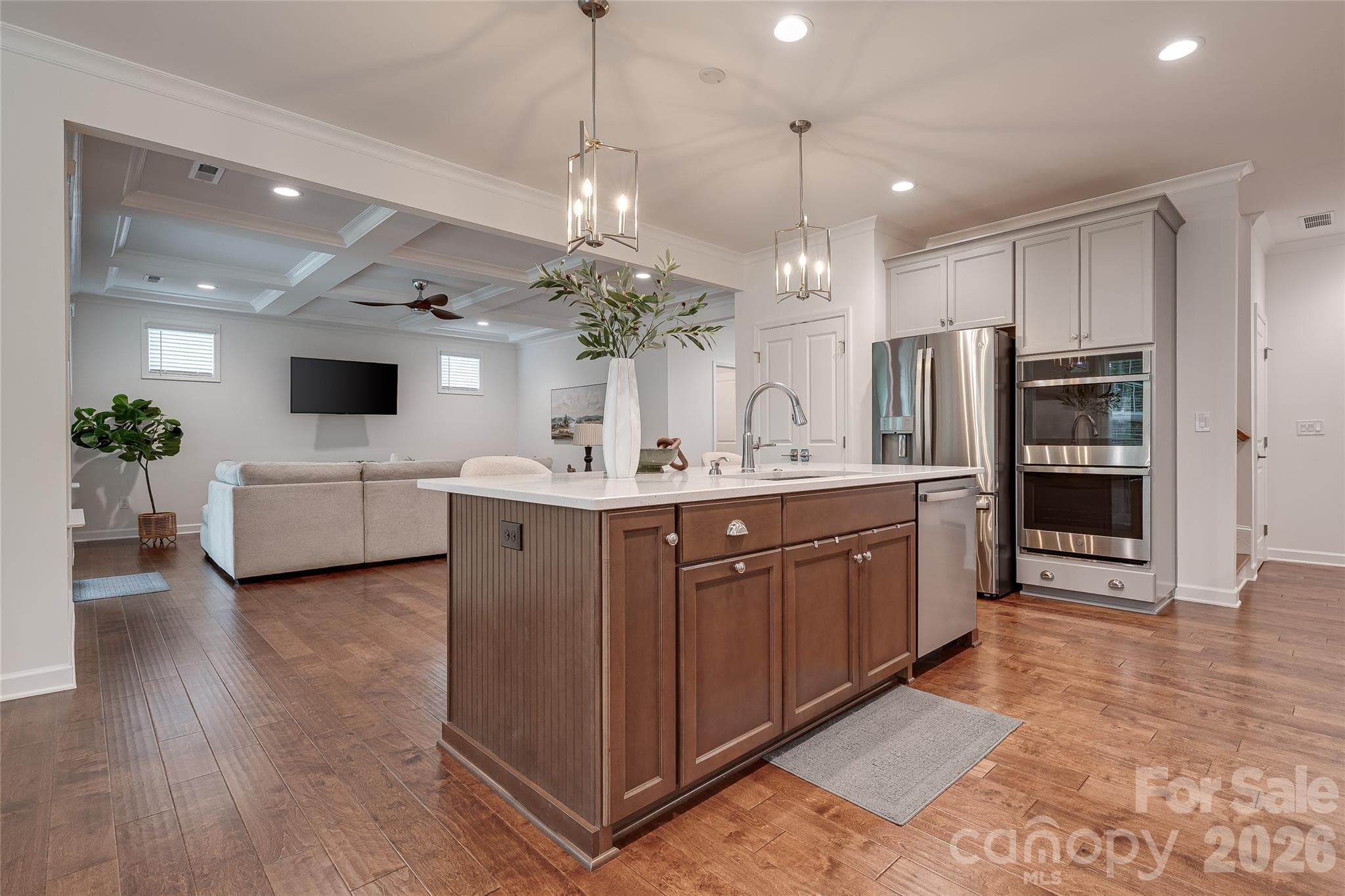 Upgraded enlarged walk-in pantry with painted wood shelves, beautiful quartz countertops and double ovens. It's a dream kitchen! - 2566 NW Red Hill Street, Concord