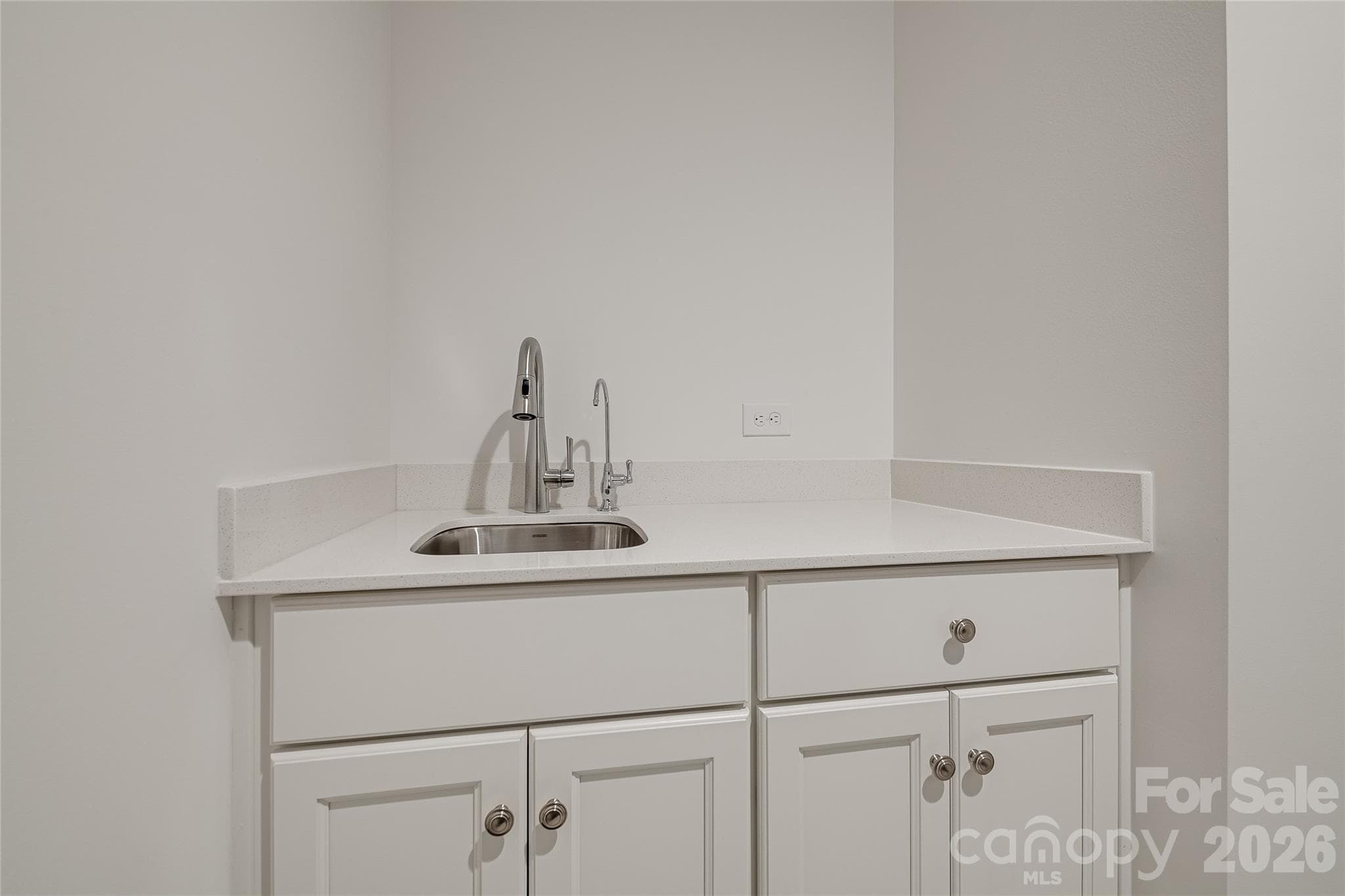 Laundry room has a convenient utility sink. - 2566 NW Red Hill Street, Concord