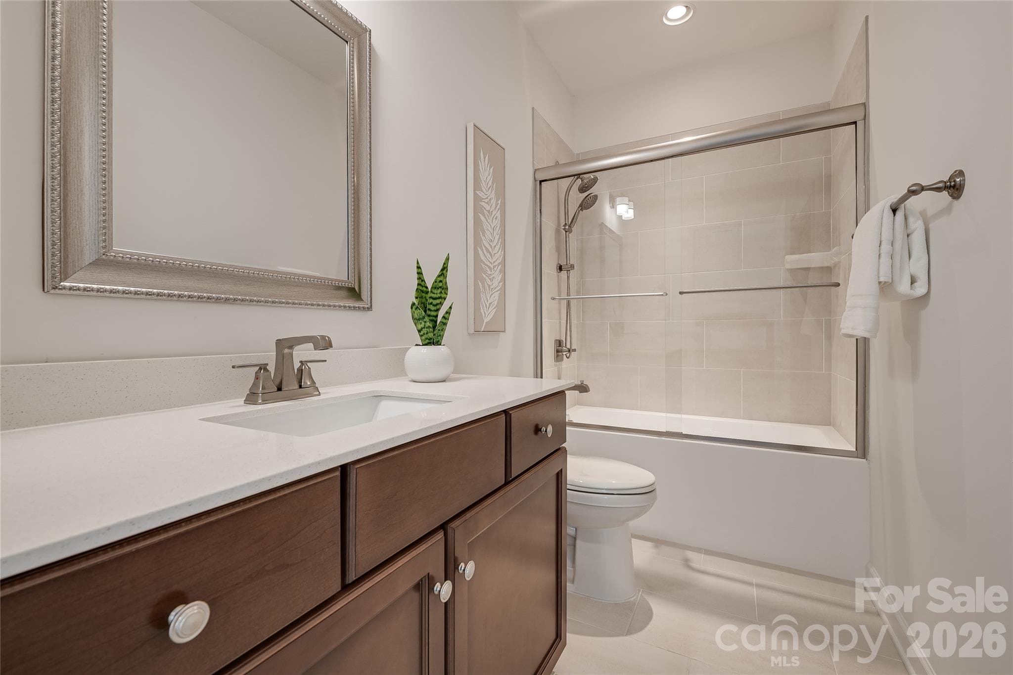 The upstairs bedroom has a full private bath and large walk-in closet. - 2566 NW Red Hill Street, Concord
