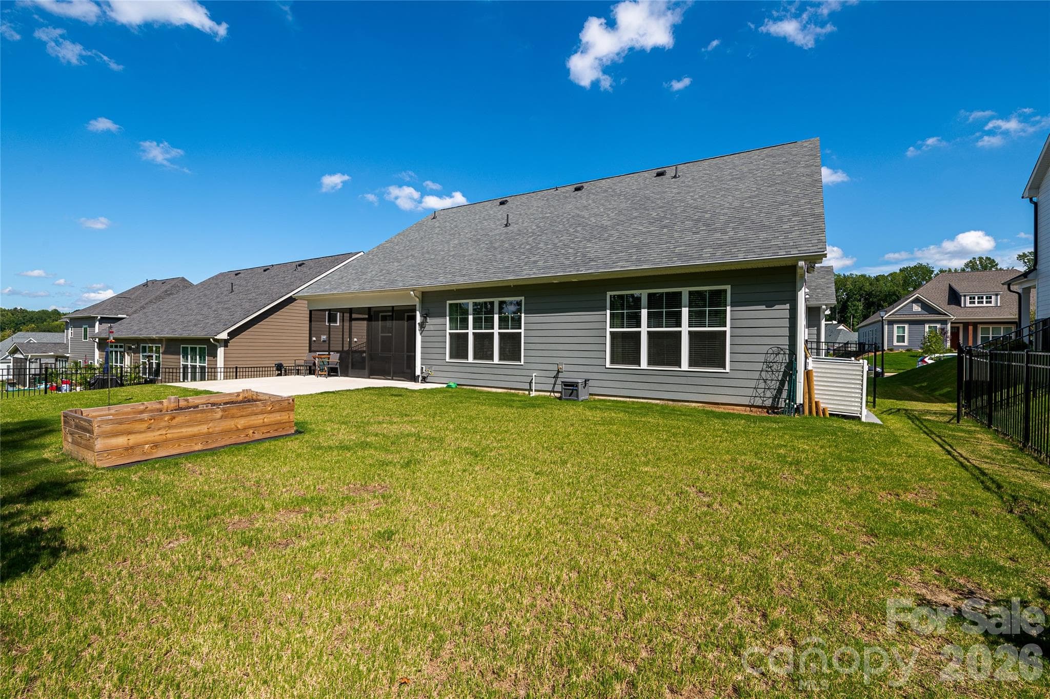 Spacious back yard with a raised garden bed. - 2566 NW Red Hill Street, Concord