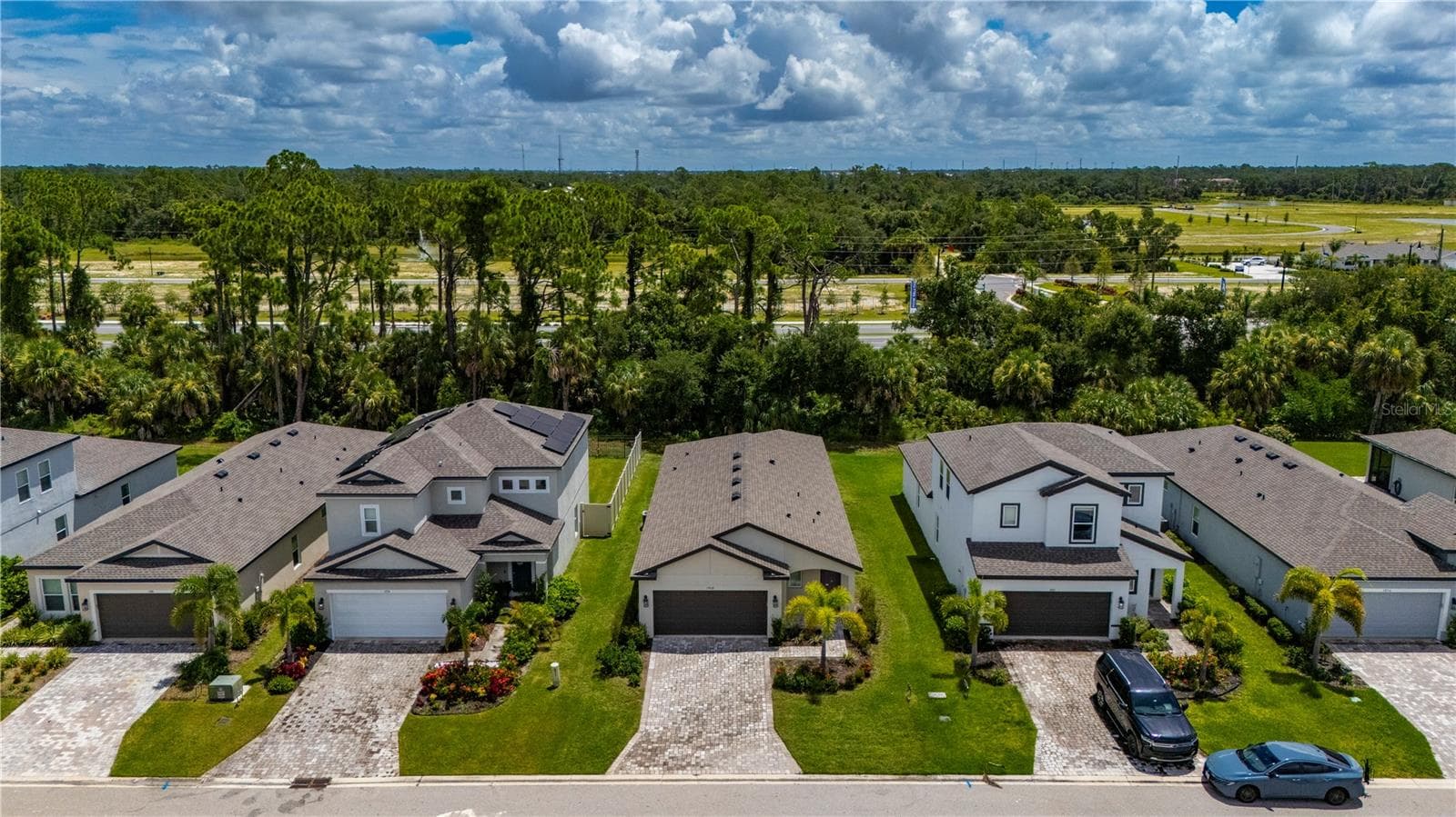 Nice wooded area behind the home. - 1968 SUNSET PRESERVE WAY, PORT CHARLOTTE