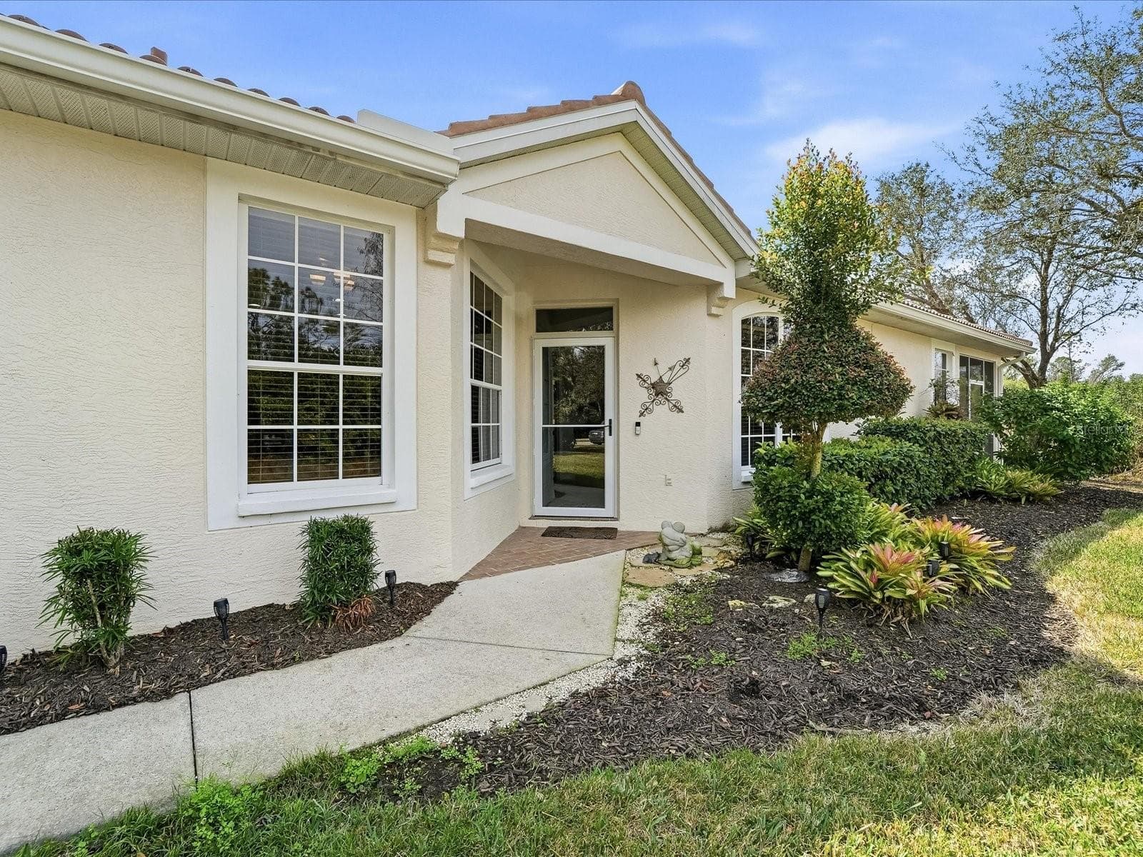 Front entrance of 4693 Whispering Oaks Dr - 4693 WHISPERING OAKS DR, NORTH PORT