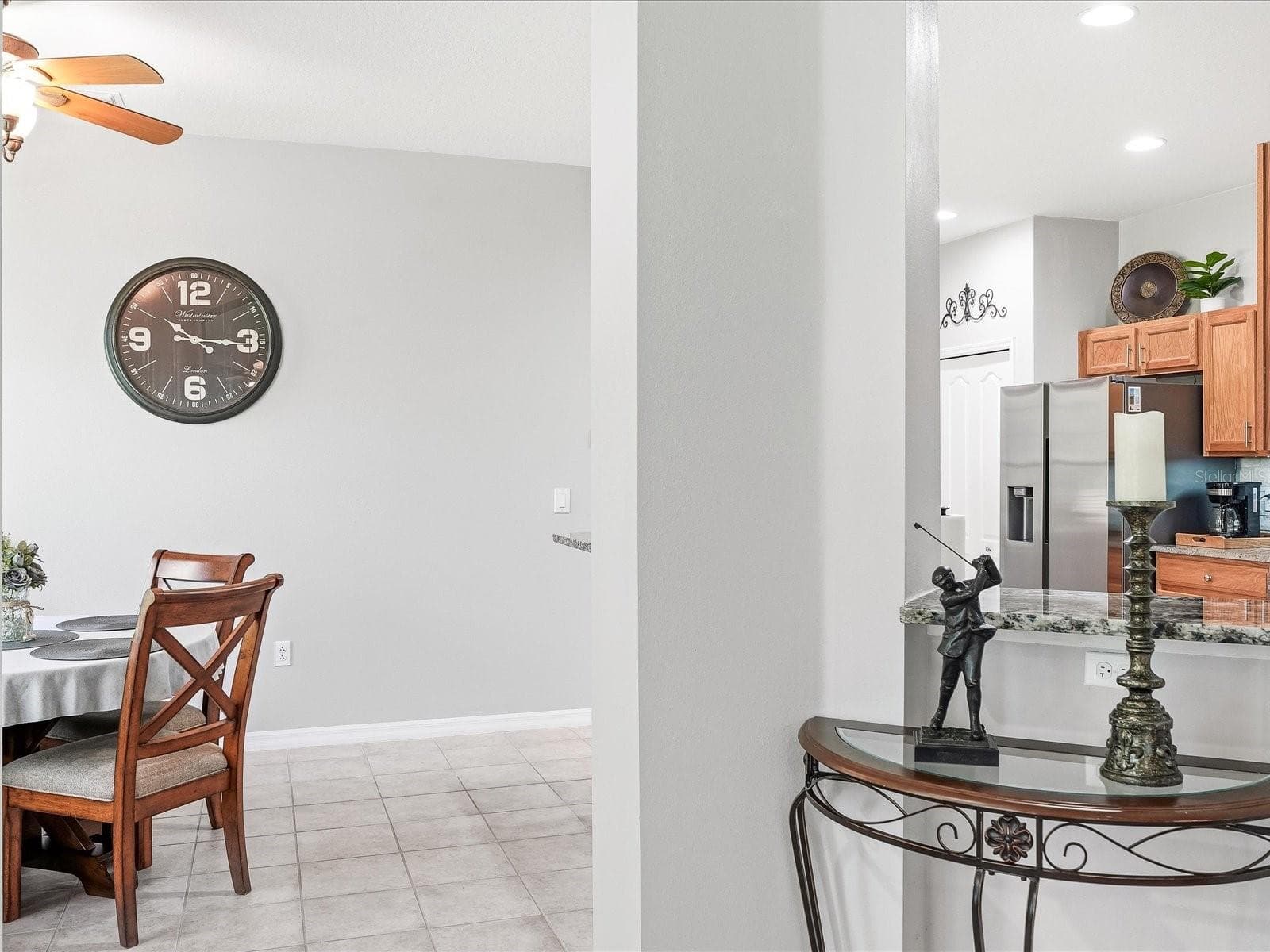 Entering dining/kitchen area - 4693 WHISPERING OAKS DR, NORTH PORT
