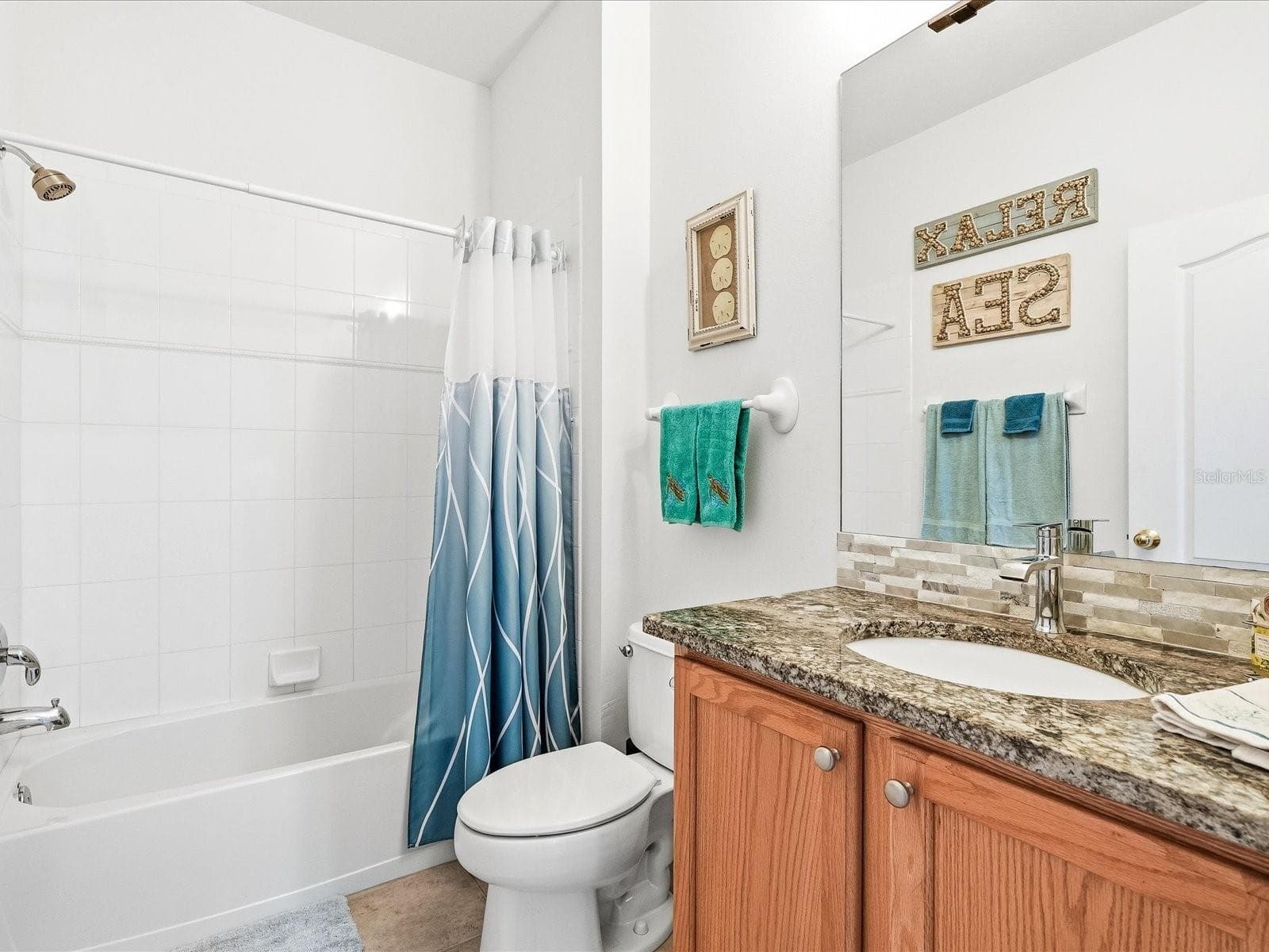Guest bathroom - 4693 WHISPERING OAKS DR, NORTH PORT