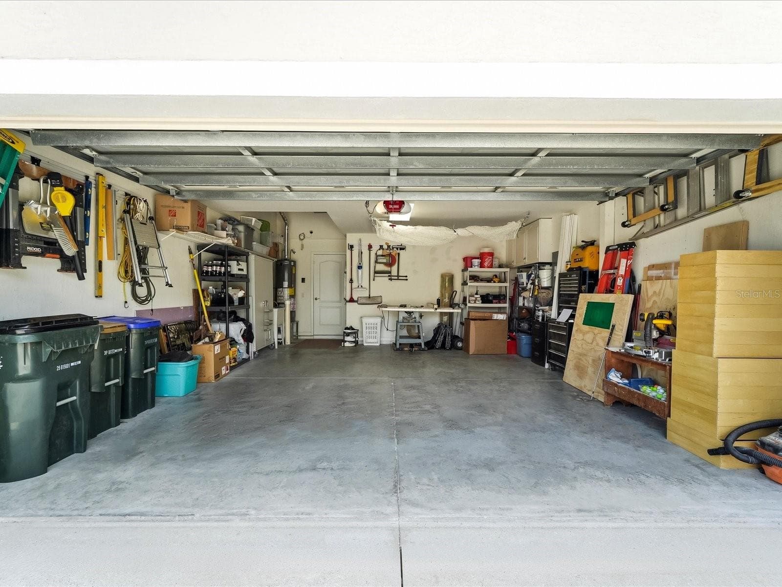 Two car garage - 4693 WHISPERING OAKS DR, NORTH PORT