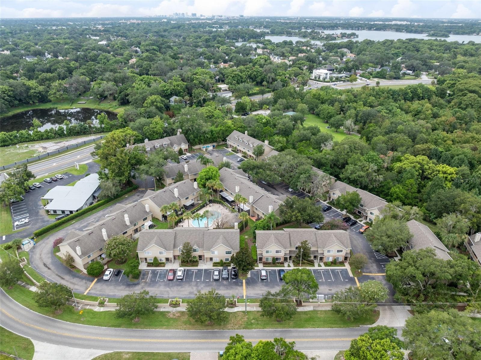 Sandlewood Creek is a quiet, established community with a community pool and one assigned parking space. Maitland Community Park is located directly behind the community and connects to additional park space, offering convenient access to trails and outdoor recreation. Schools are nearby, and Park Avenue and Downtown Winter Park are approximately 10 minutes away, putting shopping, dining and entertainment within easy reach. - 283 SANDLEWOOD TRL #3, WINTER PARK