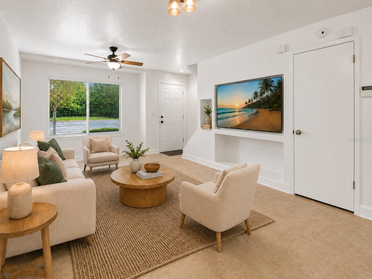 Virtual staged. The main level features a spacious open living and dining area with plenty of room to create separate gathering and dining spaces while maintaining an easy flow throughout the home. - 283 SANDLEWOOD TRL #3, WINTER PARK