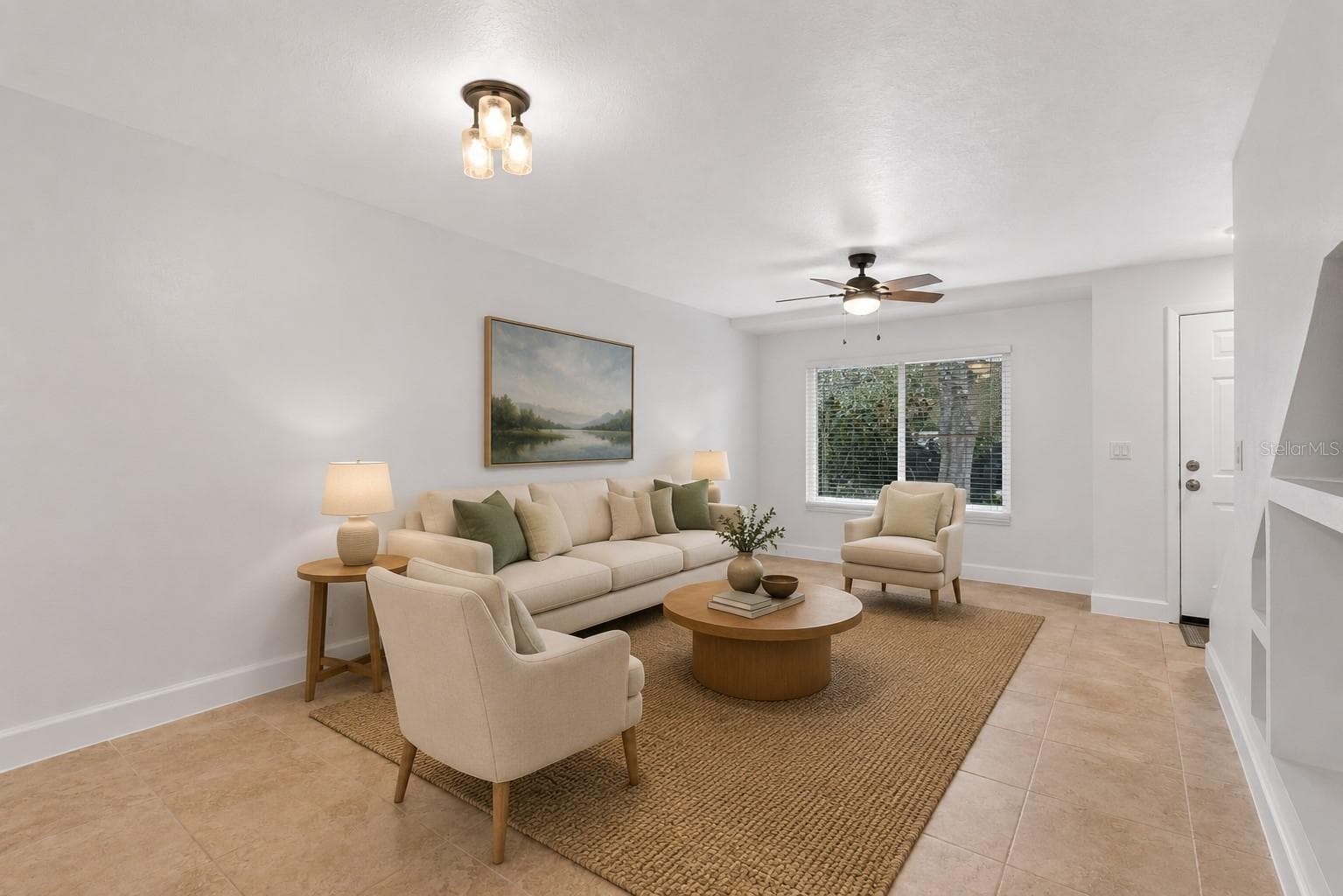 Virtual staged. The main level features a spacious open living and dining area with plenty of room to create separate gathering and dining spaces while maintaining an easy flow throughout the home. - 283 SANDLEWOOD TRL #3, WINTER PARK