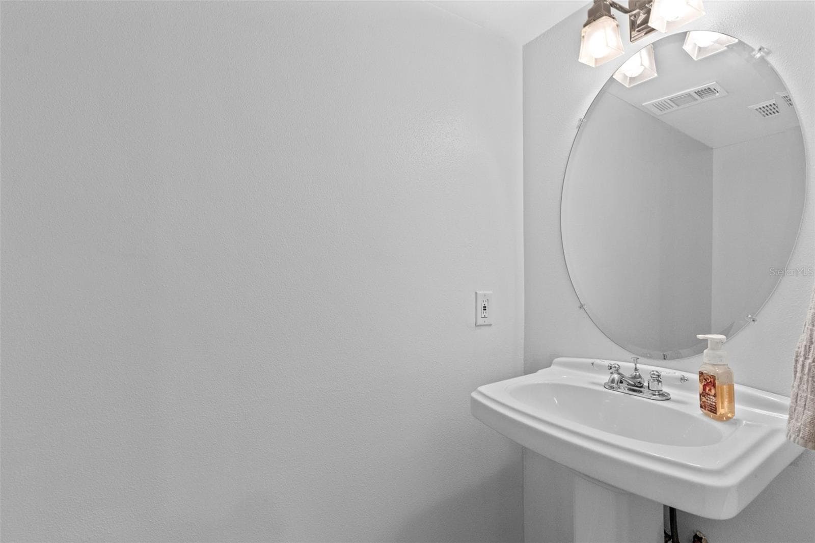 Half bathroom downstairs. - 283 SANDLEWOOD TRL #3, WINTER PARK
