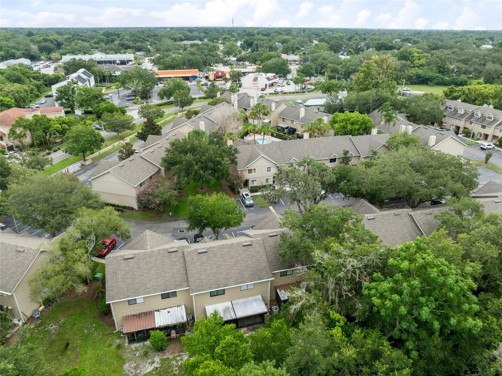 Sandlewood Creek is a quiet, established community with a community pool and one assigned parking space. Maitland Community Park is located directly behind the community and connects to additional park space, offering convenient access to trails and outdoor recreation. Schools are nearby, and Park Avenue and Downtown Winter Park are approximately 10 minutes away, putting shopping, dining and entertainment within easy reach. - 283 SANDLEWOOD TRL #3, WINTER PARK