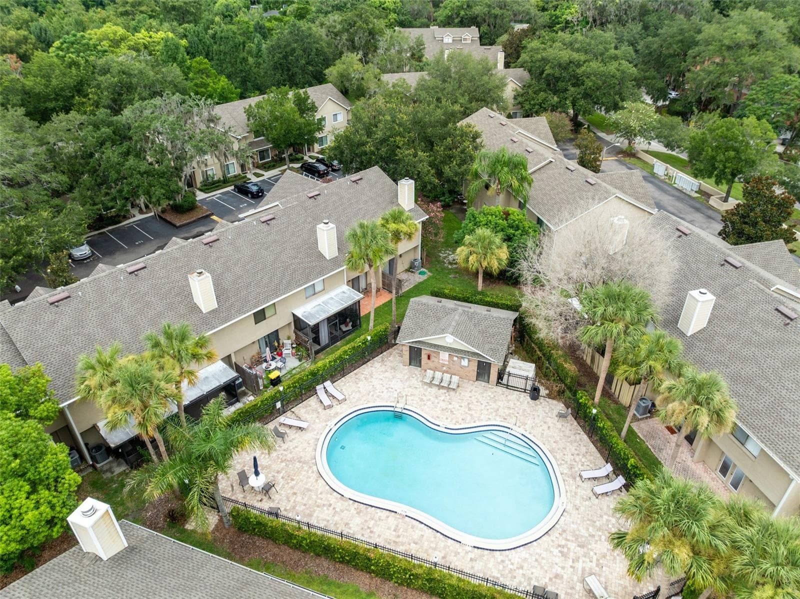 Sandlewood Creek is a quiet, established community with a community pool and one assigned parking space. Maitland Community Park is located directly behind the community and connects to additional park space, offering convenient access to trails and outdoor recreation. Schools are nearby, and Park Avenue and Downtown Winter Park are approximately 10 minutes away, putting shopping, dining and entertainment within easy reach. - 283 SANDLEWOOD TRL #3, WINTER PARK