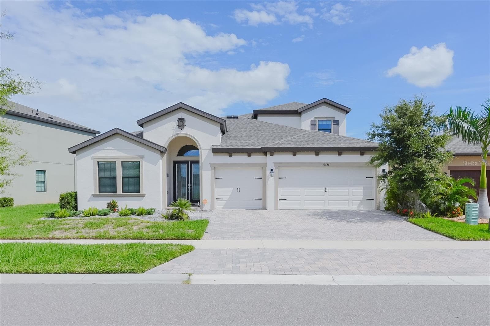 3 car garage front - 12648 BERGSTROM BAY DR, RIVERVIEW
