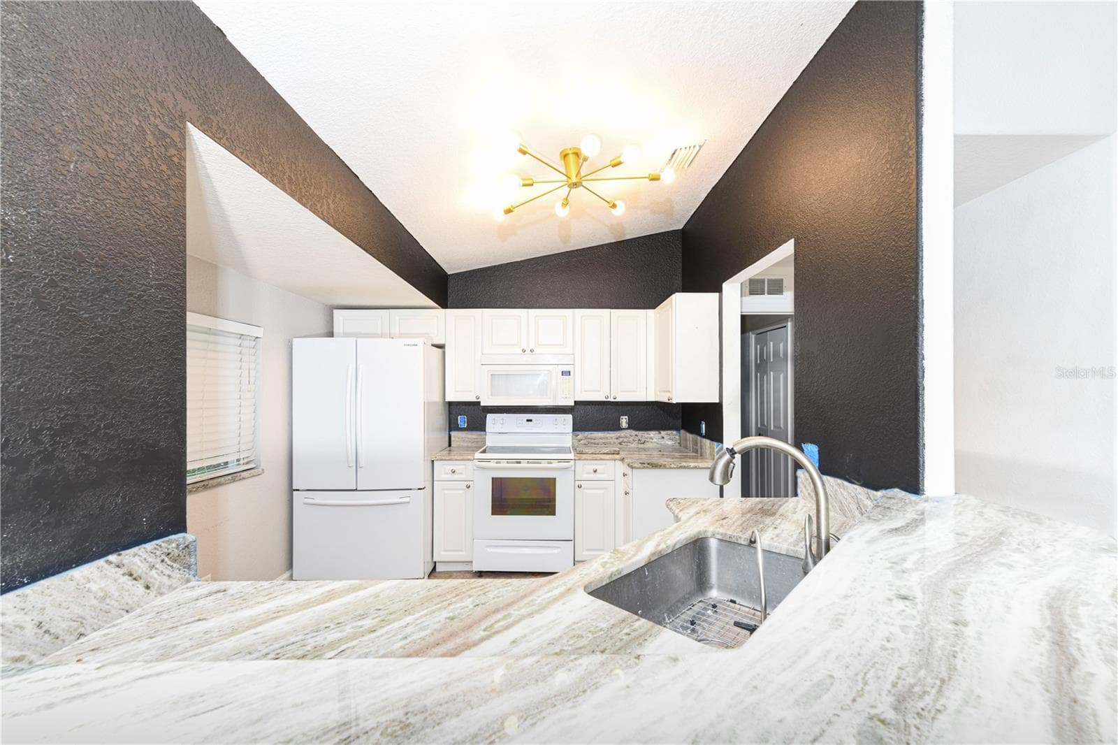 Kitchen with granite countertops - 8457 BRISTOL AVE, NORTH PORT