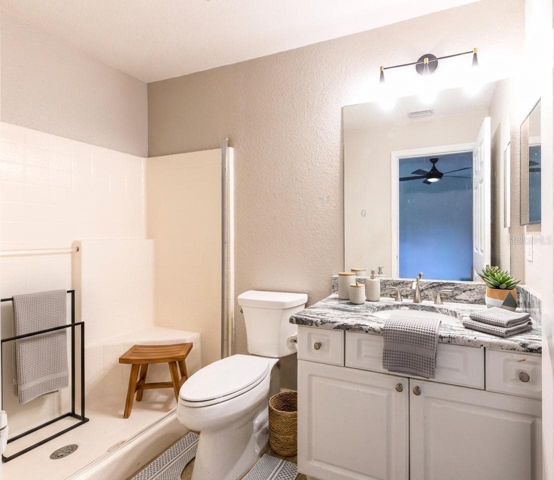 Primary en suite bathroom staged - 8457 BRISTOL AVE, NORTH PORT