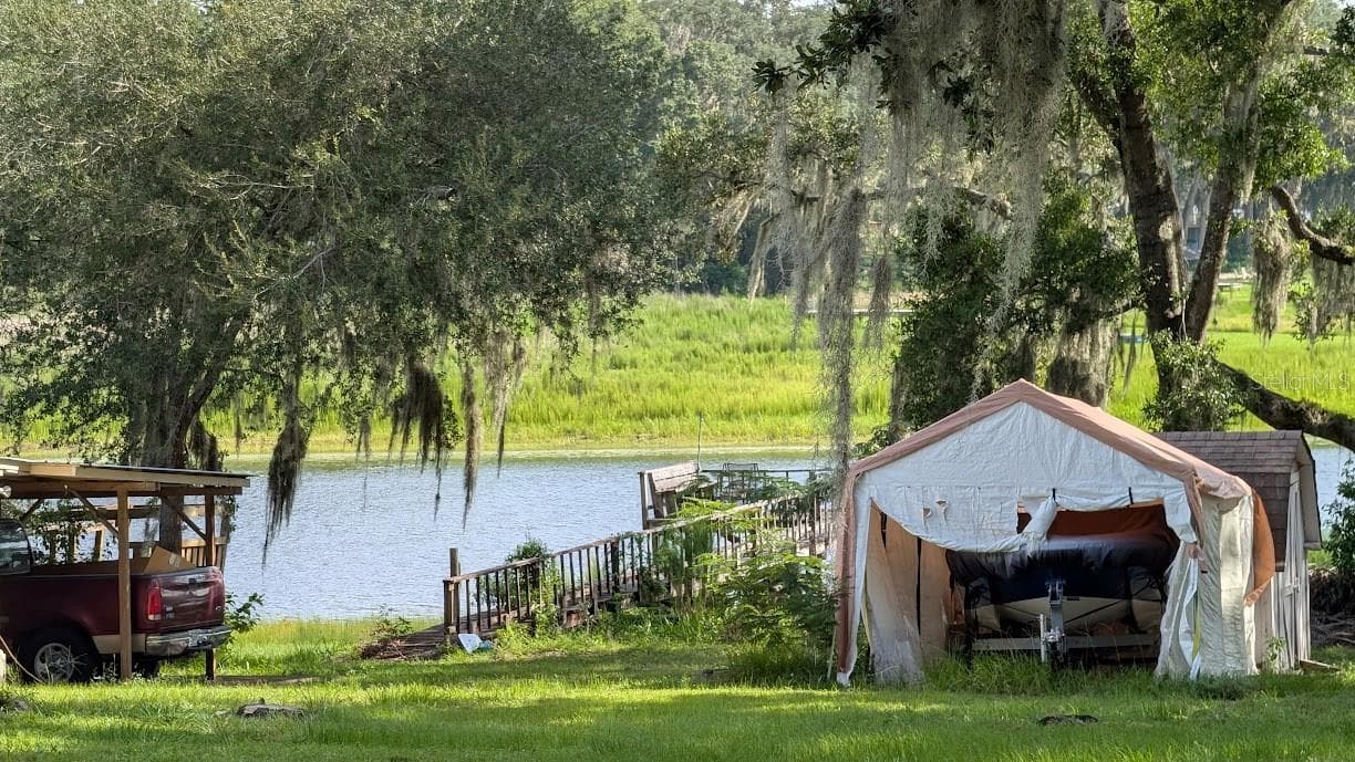 FROM THE LOT LOOKING SOUTH ACROSS THE STREET - SW SHOREWOOD DR, DUNNELLON