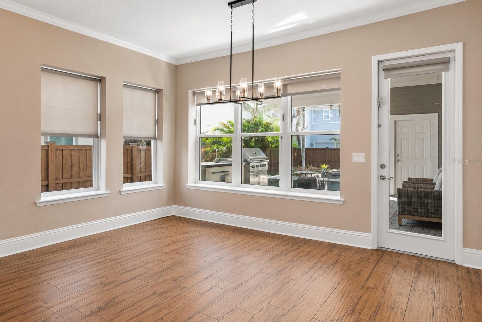 AI-edited to remove furniture to show the space - 13041 GABOR AVE, ORLANDO