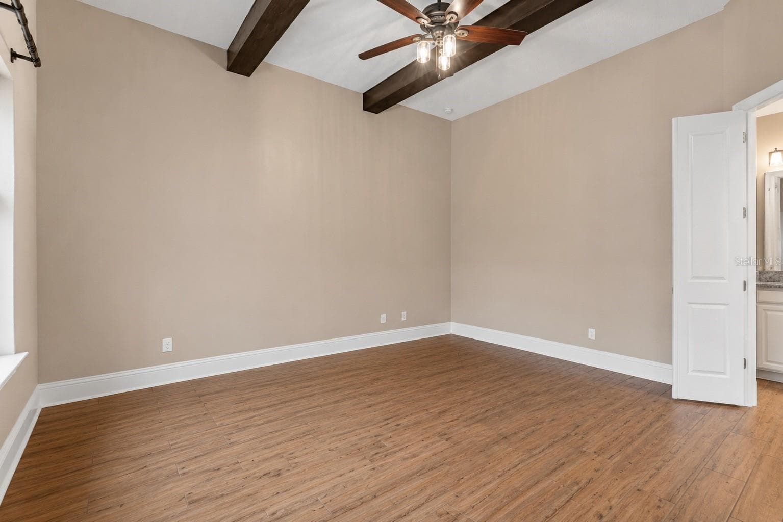AI-edited to remove furniture to show the space - 13041 GABOR AVE, ORLANDO