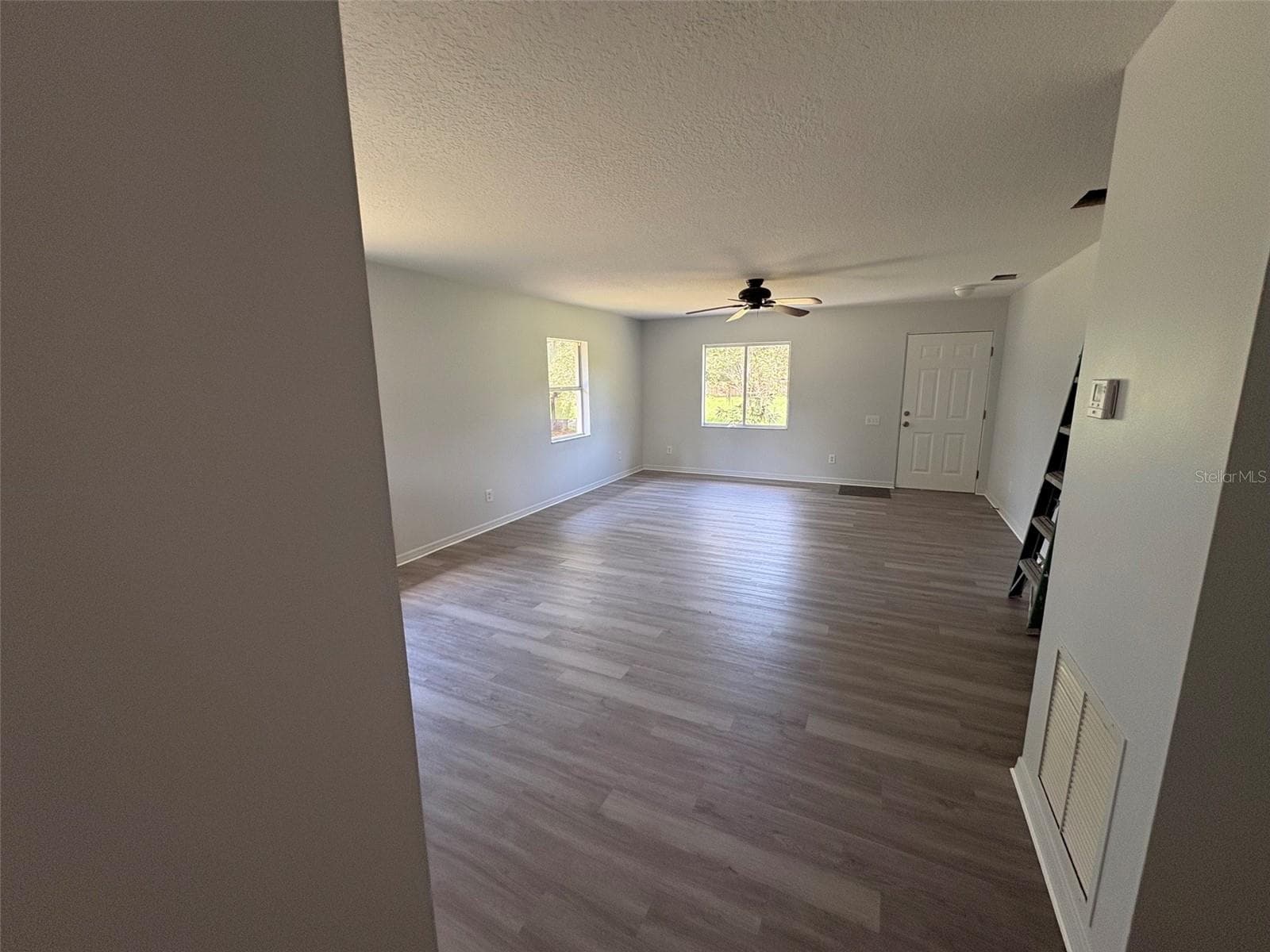 Good set up family area new flooring throughout. - 607 2ND ST NW, RUSKIN