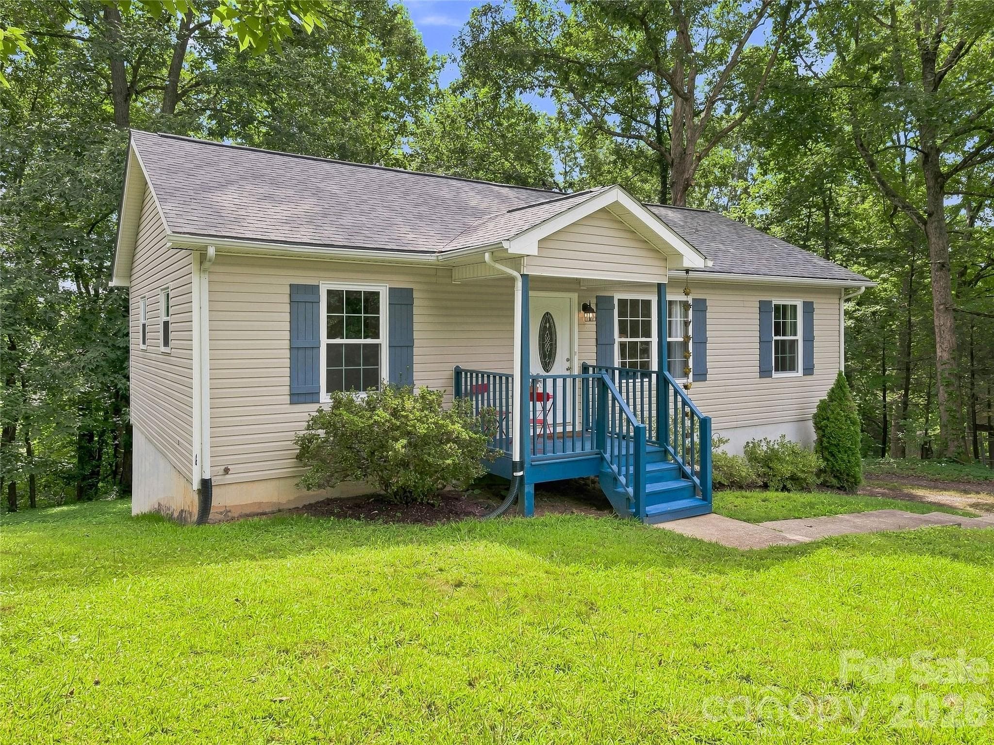 Single Family Residence at 1019 Mountain Drive, Candler, photo 2 of 28