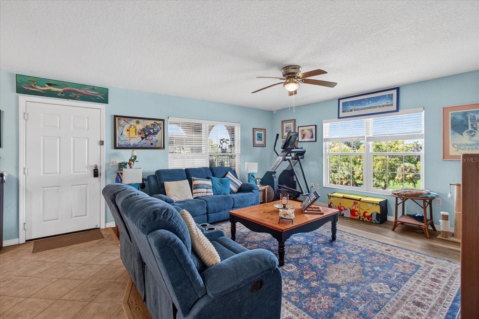 Living Room With Luxury Vinyl Plank and Impact Windows Installed in 2025 - 6100 GULFPORT BLVD S #401, GULFPORT