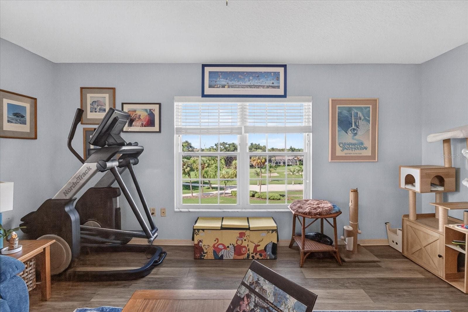 Living Room With Luxury Vinyl Plank and Impact Windows Installed in 2025 - 6100 GULFPORT BLVD S #401, GULFPORT