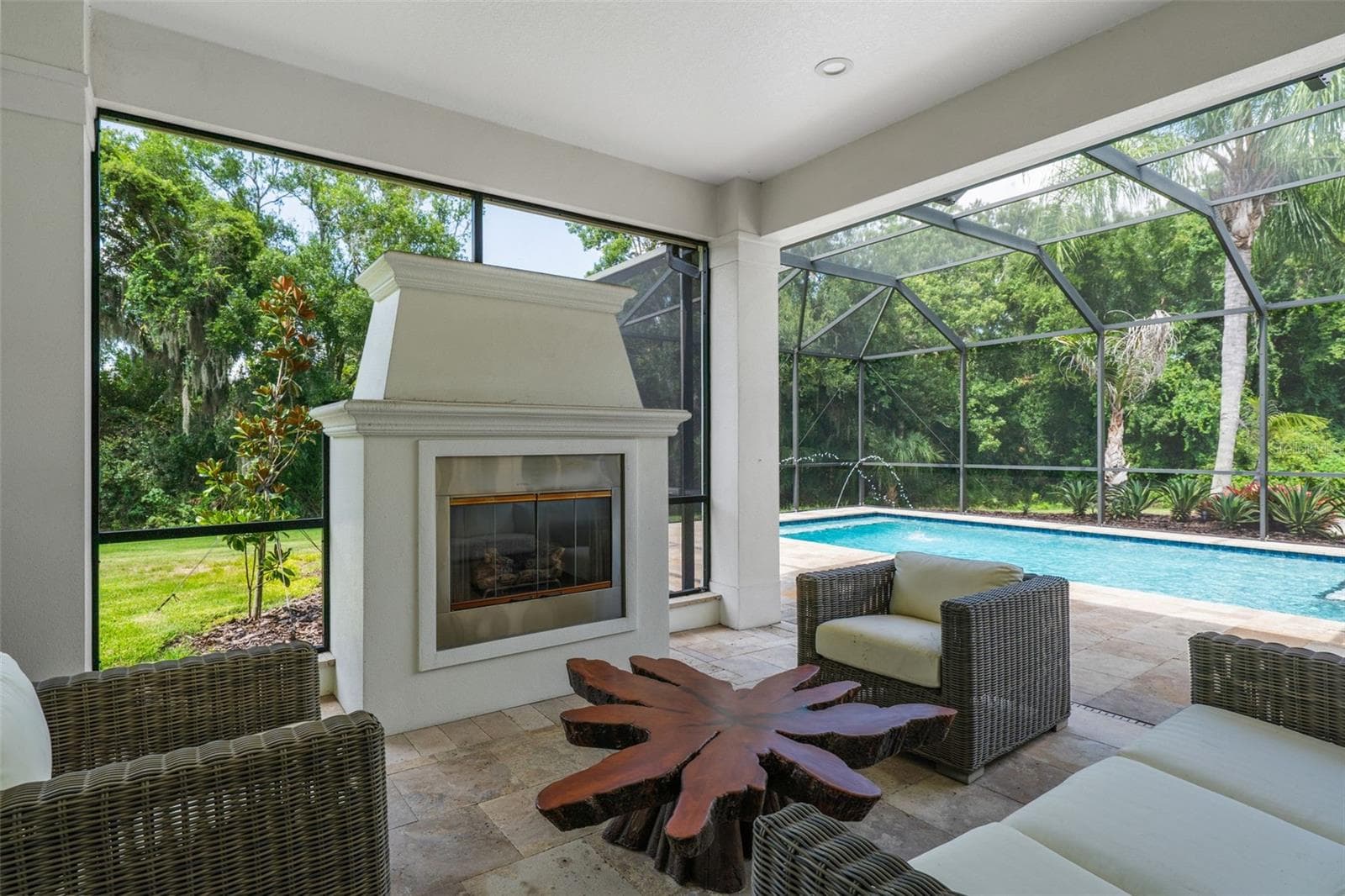 Covered Seating Area with Outdoor Fireplace - 14205 9TH TER NE, BRADENTON