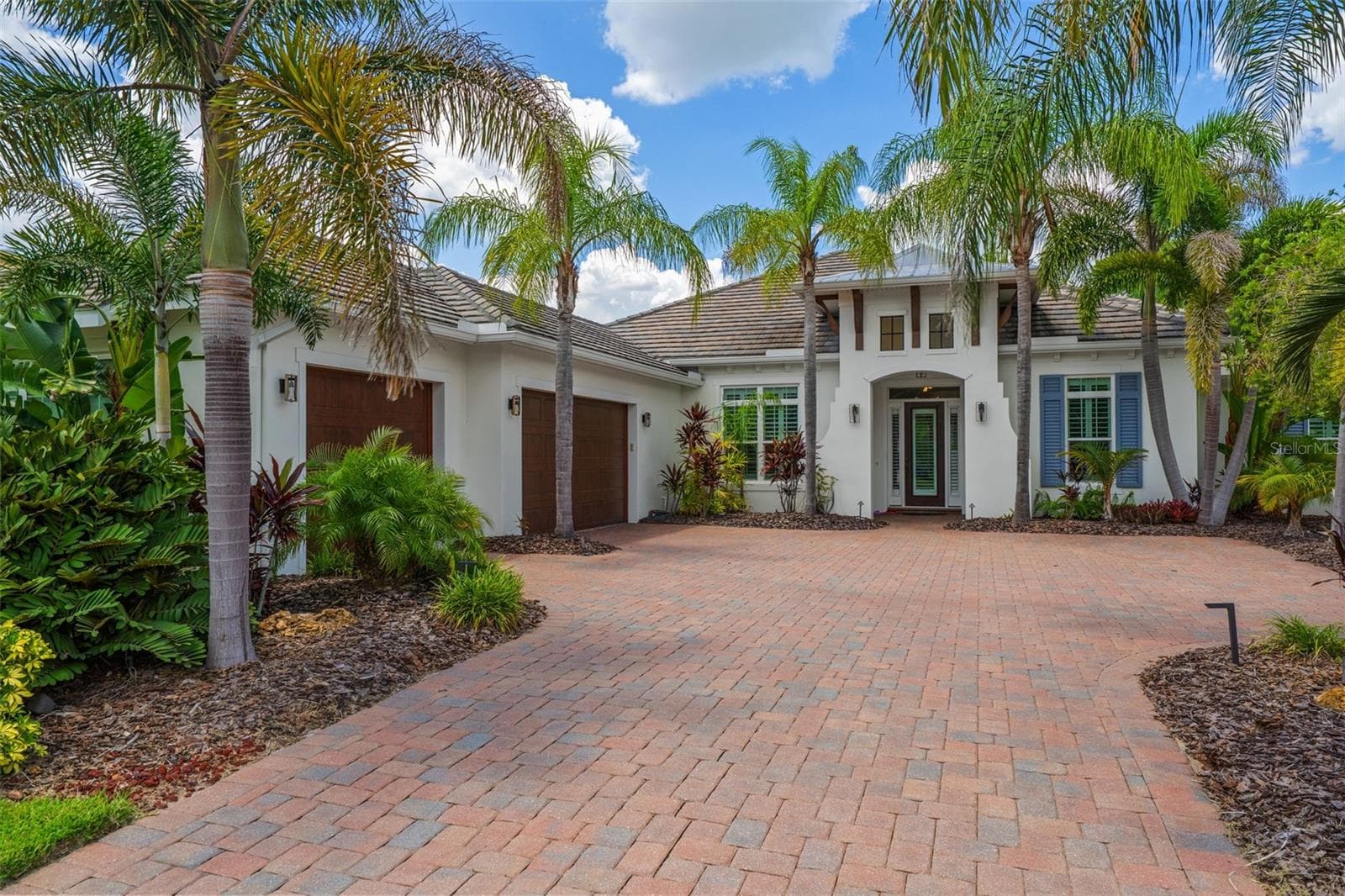 Front Exterior with 3 Car Garage - 14205 9TH TER NE, BRADENTON