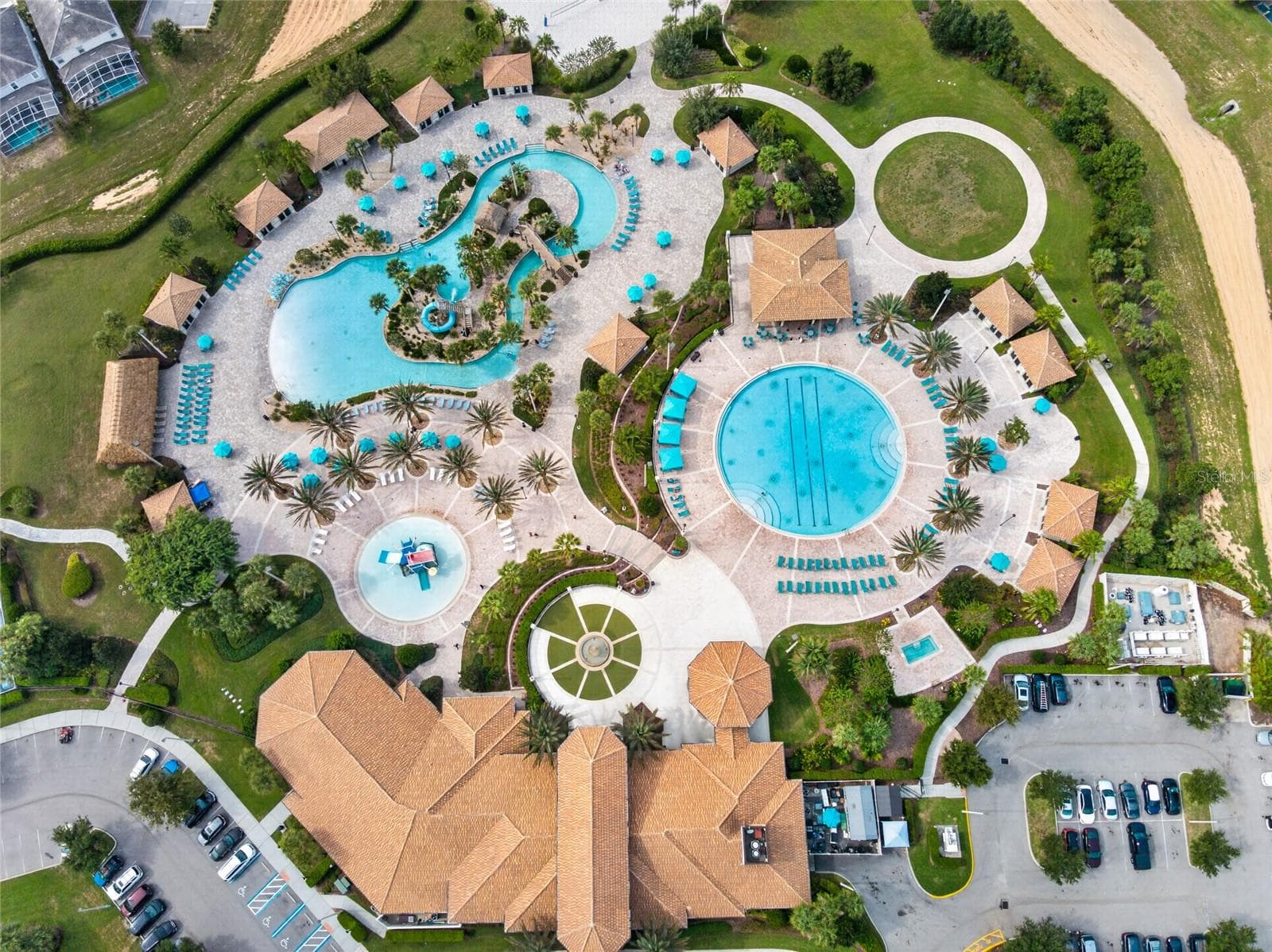 Resort-style living at ChampionsGate! Enjoy incredible community amenities including resort pools, a lazy river, water slides, splash areas, clubhouse, fitness center, dining, sports courts and more—all designed to make every day feel like a vacation. - 8813 BETH PAGE LN, DAVENPORT