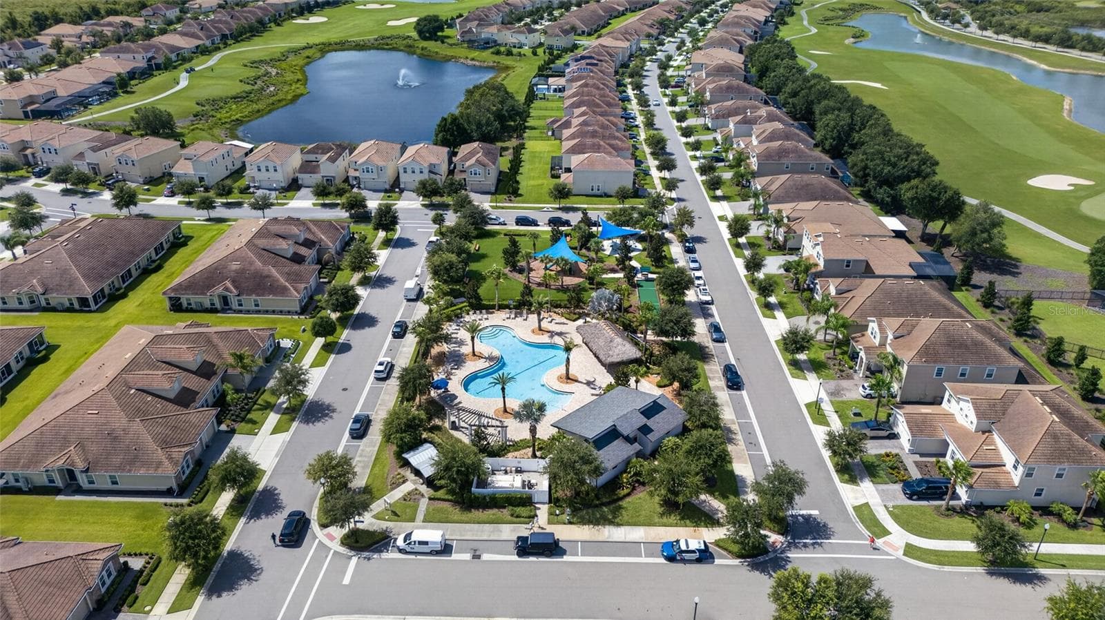 Resort-style living at ChampionsGate! Enjoy incredible community amenities including resort pools, a lazy river, water slides, splash areas, clubhouse, fitness center, dining, sports courts and more—all designed to make every day feel like a vacation.Resort-style living at ChampionsGate! Enjoy incredible community amenities including resort pools, a lazy river, water slides, splash areas, clubhouse, fitness center, dining, sports courts and more—all designed to make every day feel like a vacation. - 8813 BETH PAGE LN, DAVENPORT