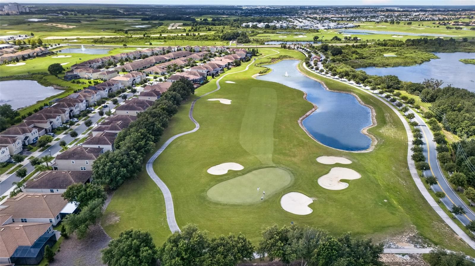 Resort-style living at ChampionsGate! Enjoy incredible community amenities including resort pools, a lazy river, water slides, splash areas, clubhouse, fitness center, dining, sports courts and more—all designed to make every day feel like a vacation. - 8813 BETH PAGE LN, DAVENPORT