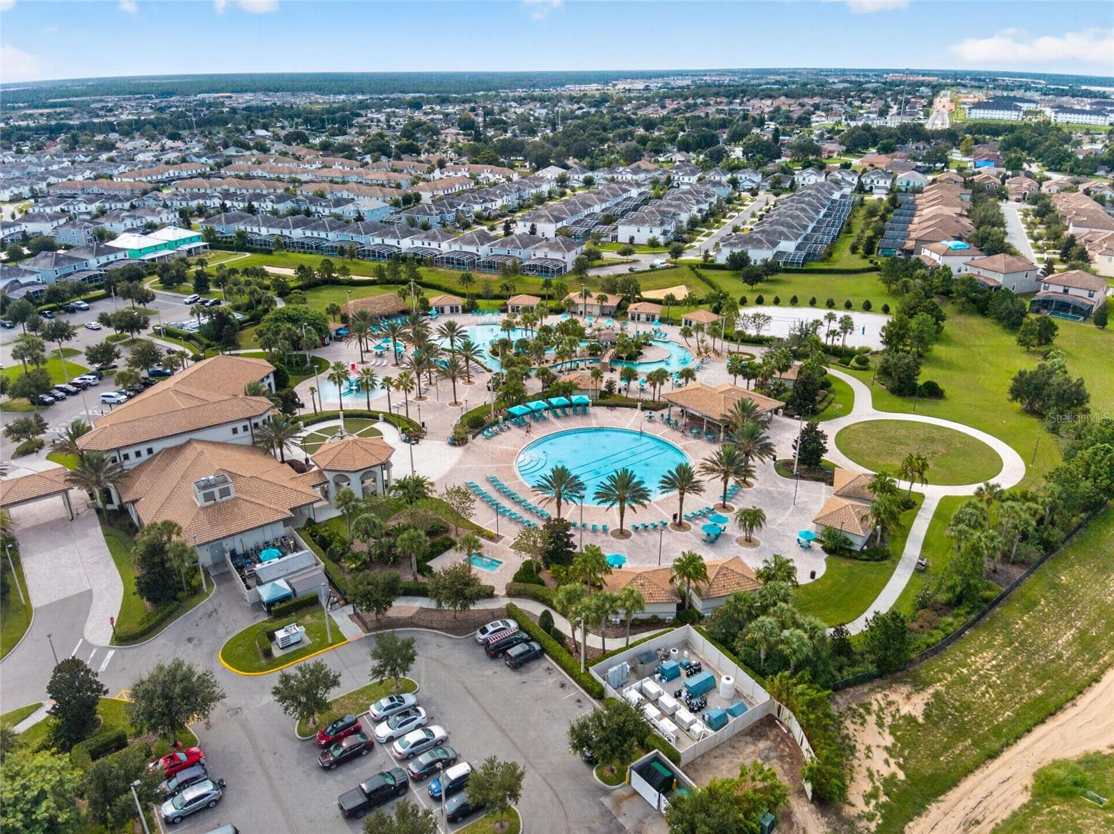 Resort-style living at ChampionsGate! Enjoy incredible community amenities including resort pools, a lazy river, water slides, splash areas, clubhouse, fitness center, dining, sports courts and more—all designed to make every day feel like a vacation. - 8813 BETH PAGE LN, DAVENPORT