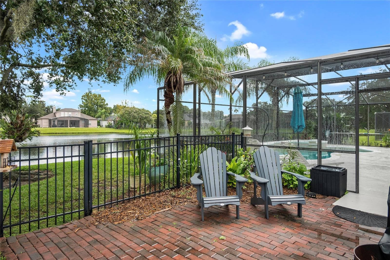 side fenced pavered patio- perfect for BBQ - 2848 ALOMA LAKE RUN, OVIEDO