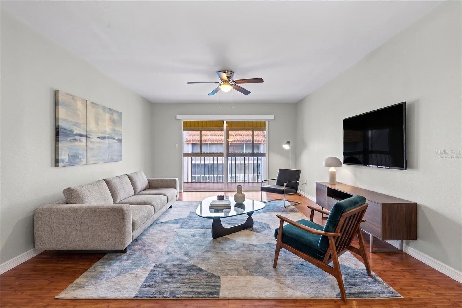 Living Room virtually staged - 1310 GLEN OAKS DR E #383E, SARASOTA