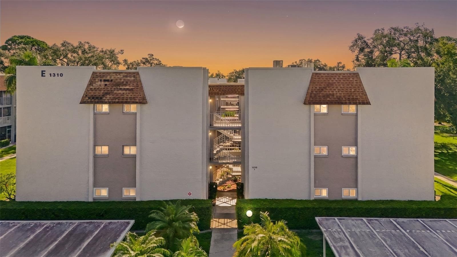 Twilight of building - 1310 GLEN OAKS DR E #383E, SARASOTA