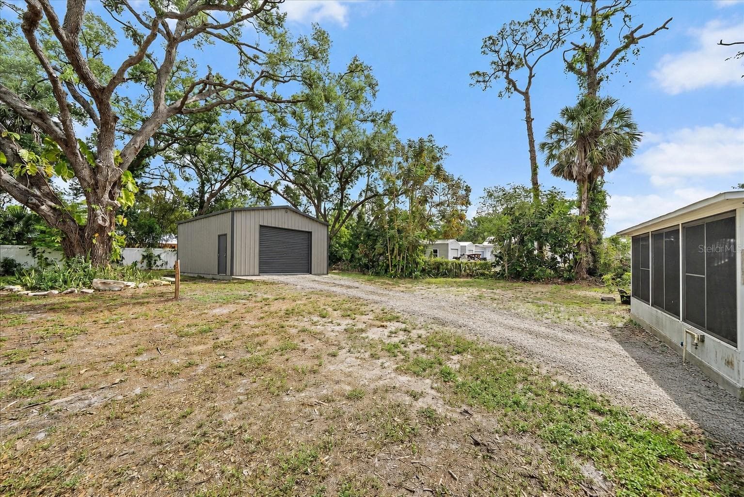 Property reimagined with a metal building or detached garage - 2503 53RD AVE W, BRADENTON