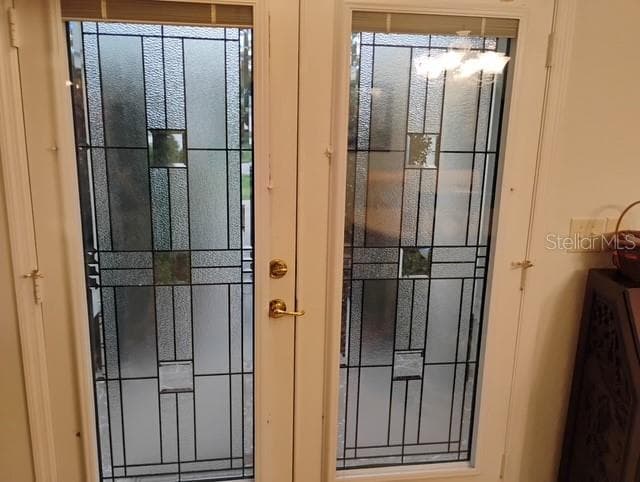 Built in shades on front door - 6321 SW 117TH LOOP, OCALA