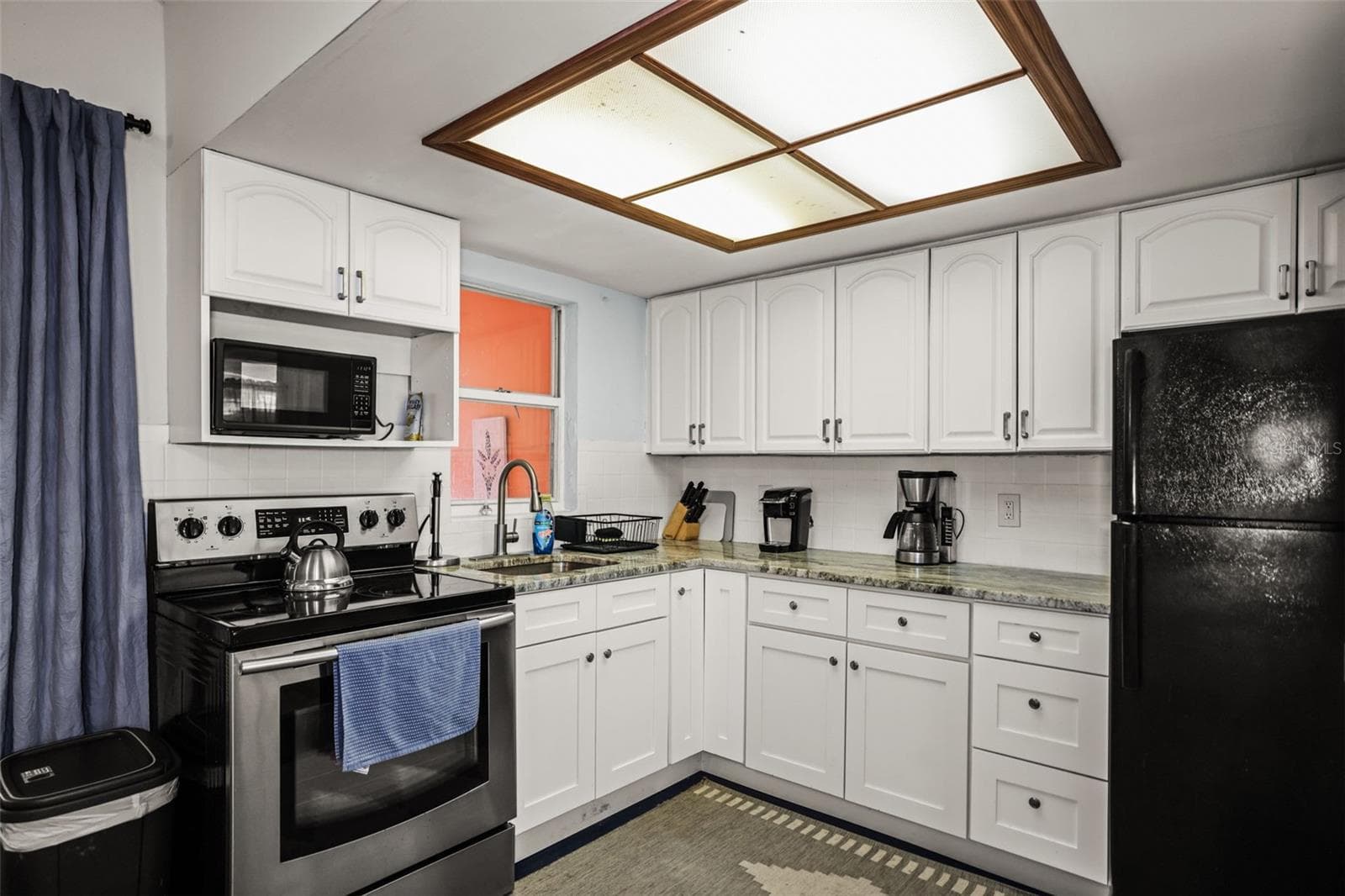 Single Family Residence at 14023 PALM ST, MADEIRA BEACH, photo 12 of 38