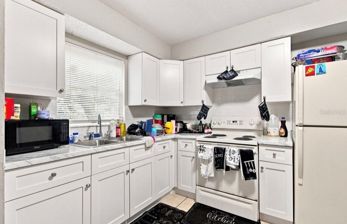 Duplex at 8602-8606 N 14TH ST, TAMPA, photo 6 of 57