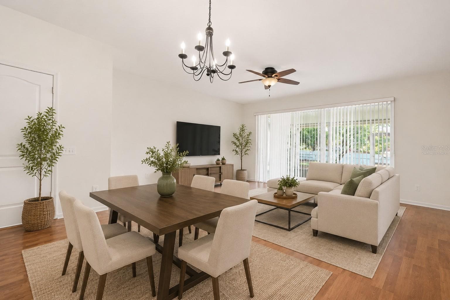 Virtually Staged Living & Dining Room - 8471 SANDY BEACH ST, TAMPA
