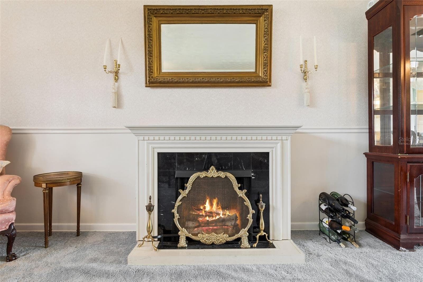 virtually staged fire in fireplace - 5004 S HESPERIDES ST, TAMPA