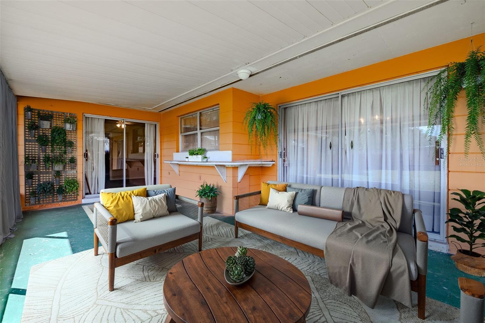 rear patio virtually staged - 5004 S HESPERIDES ST, TAMPA