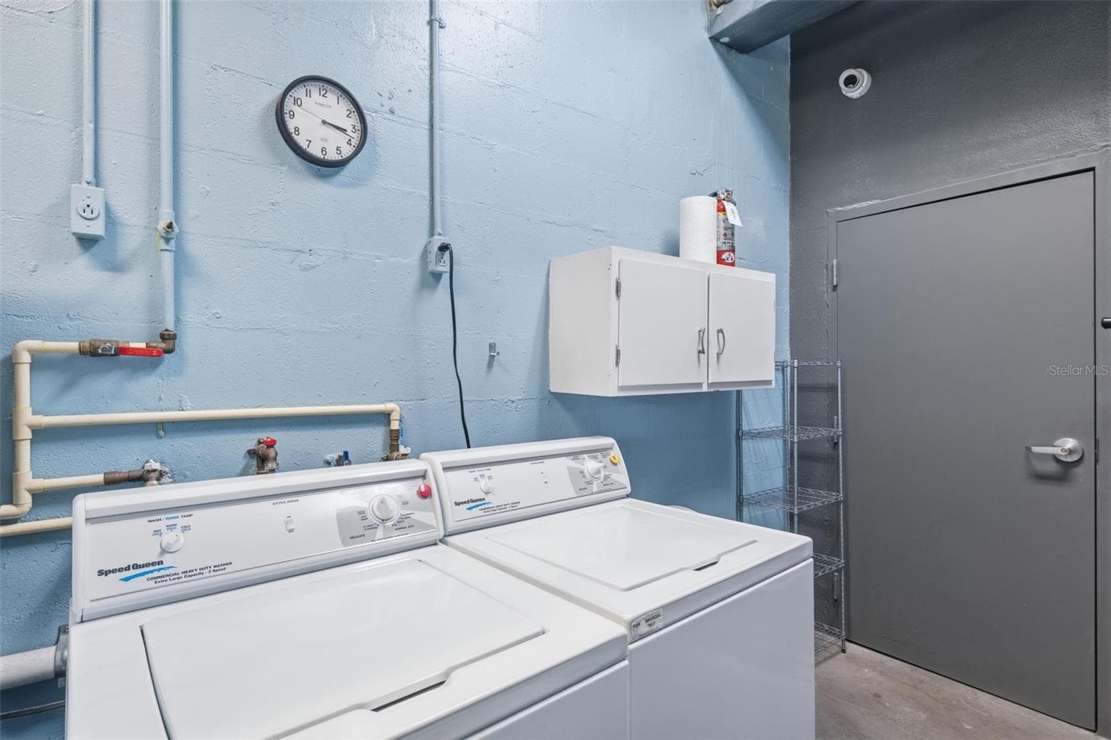 Clean and conveniently located community laundry area with updated machines. - 841 4TH AVE N #27, ST PETERSBURG