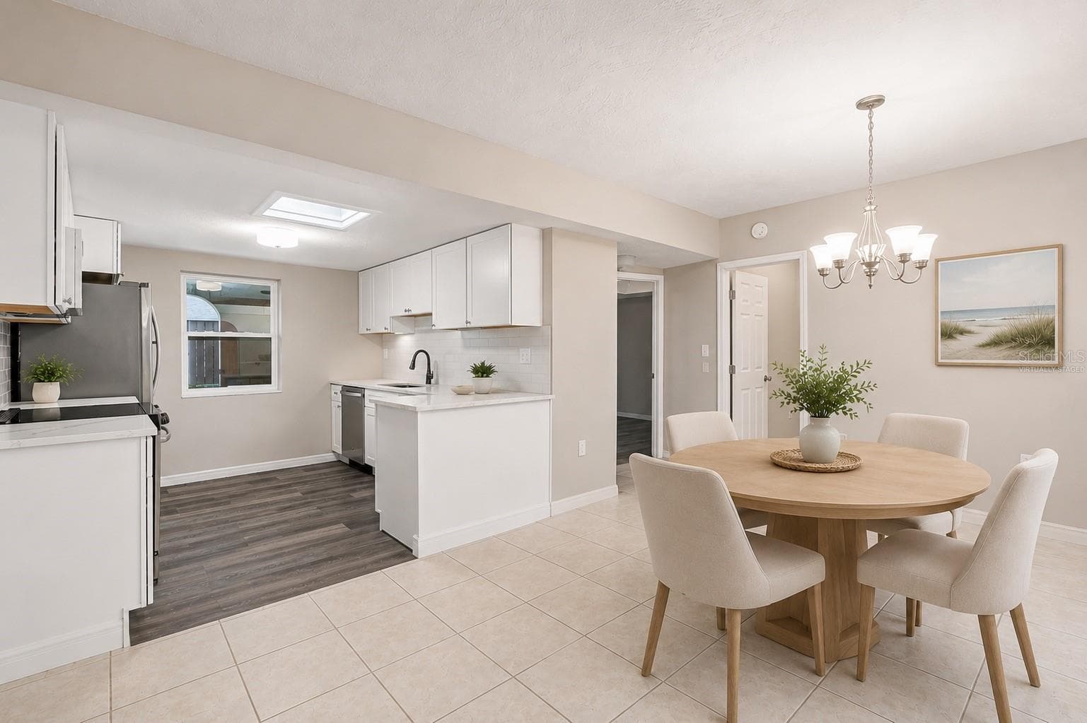 Virtually Staged Open Dining Area Flowing Seamlessly Into Updated Kitchen - 1005 ALSTON LN, ENGLEWOOD